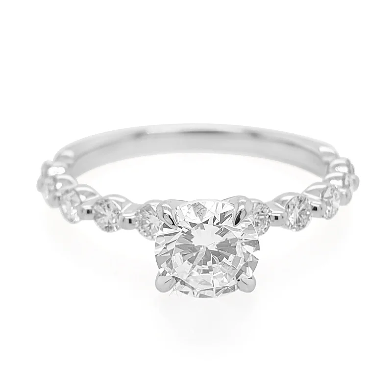 Pear - shaped diamond engagement ring with side baguette diamonds in 18K goldWhite Gold Diamond Engagement Ring Setting with Shared Prong Diamond Band, 0.47cttw