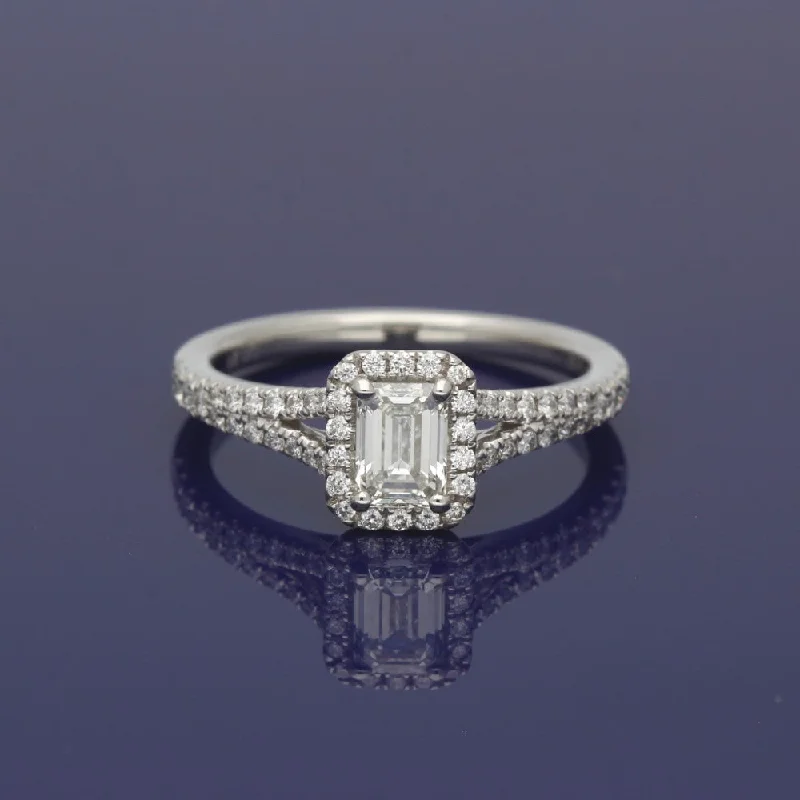 Three - Stone Women's Diamond Rings Symbolizing Past, Present, and Future with Emerald - Cut DiamondsPlatinum Certificated Emerald Cut Diamond Halo Ring