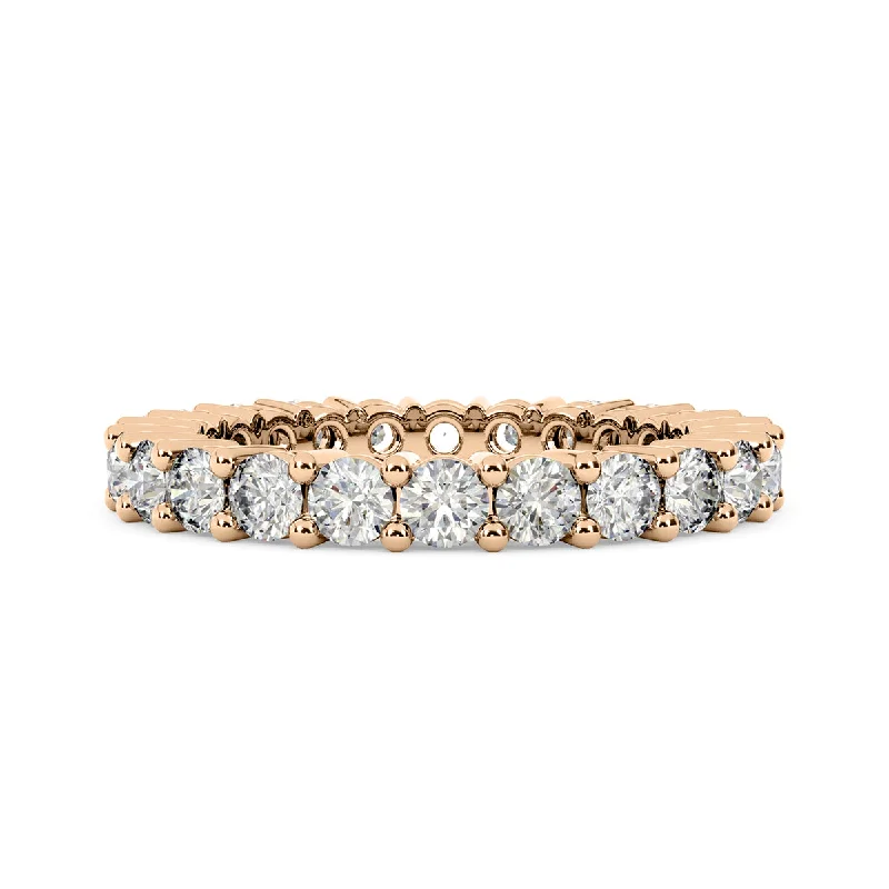 Three - Stone Women's Diamond Rings Symbolizing Past, Present, and Future with Emerald - Cut DiamondsDiamond Eternity Ring