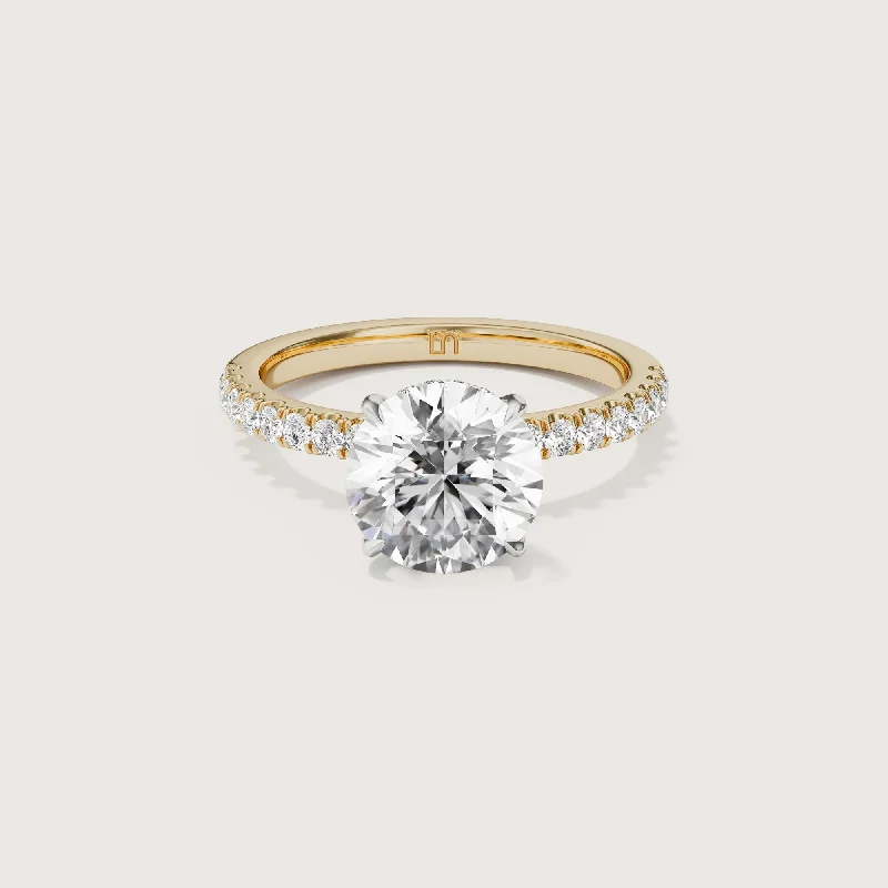 Solitaire diamond engagement ring with a platinum setting for a classic and elegant lookVera Round Solitaire - Hidden Halo Diamond Band