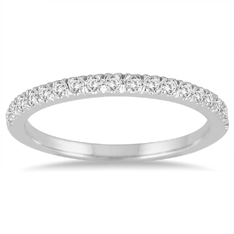 Halo - Style Women's Diamond Rings with a Center Diamond Surrounded by Smaller Diamonds in 18K Gold1/4 Carat TW Diamond Wedding Band in 14K White Gold