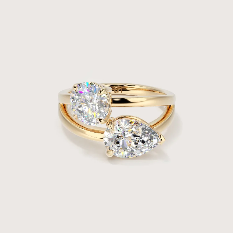 Round - cut diamond engagement ring with a twisted band design in 14K white goldAura Toi-et-Moi Round Pear Two Stone