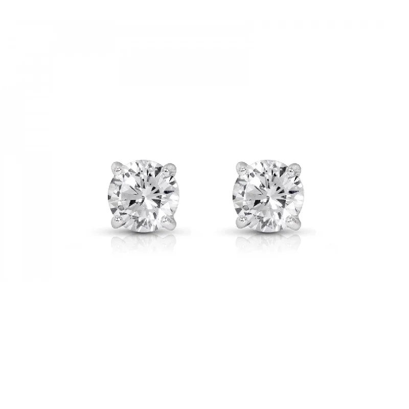 Emerald and diamond engagement ring in a vintage - inspired platinum bandClassic 4-Prong Diamond Stud Earrings - 0.75 twt.