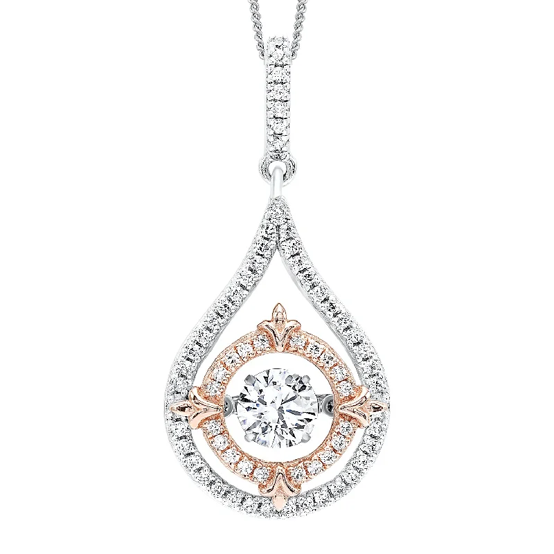 Emerald - cut diamond engagement ring set in a modern titanium bandRhythm of Love CZ Pendant in Sterling Silver