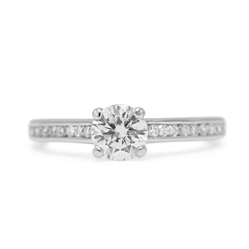 Cathedral - Style Women's Diamond Rings with a Raised Center Setting and Elaborate MetalworkGIA Certificated 0.60ct Platinum Solitaire Diamond Ring