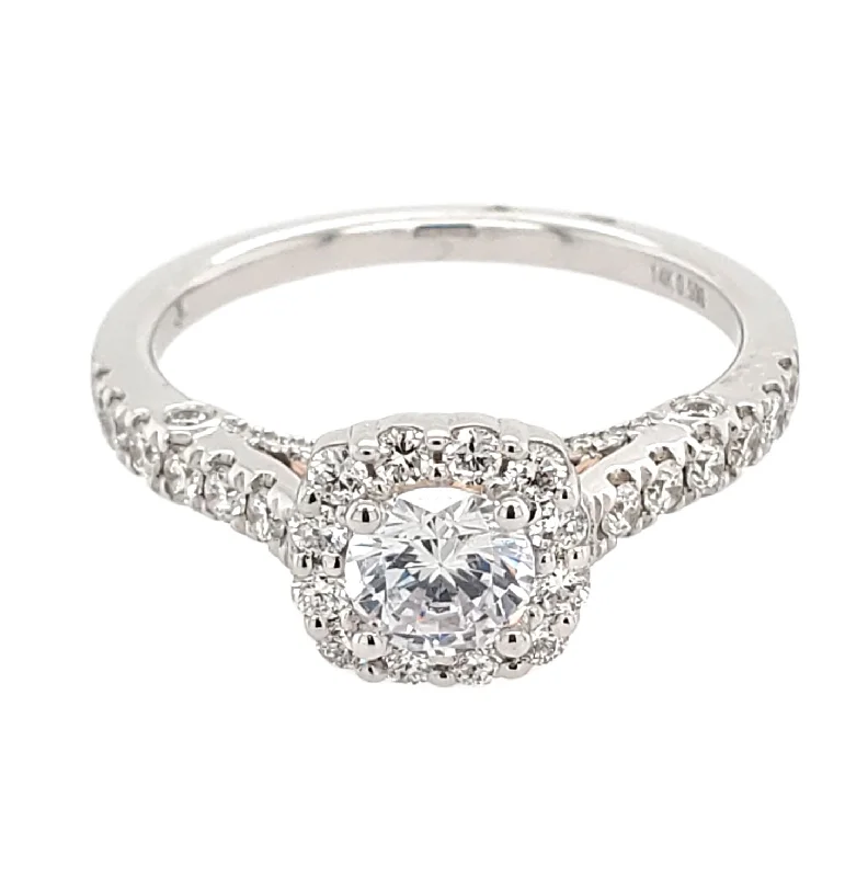 Radiant - cut diamond engagement ring with a bezel - set center stone in 18K yellow goldCushion-Shaped Halo Diamond Engagement Ring Setting, 0.5cttw