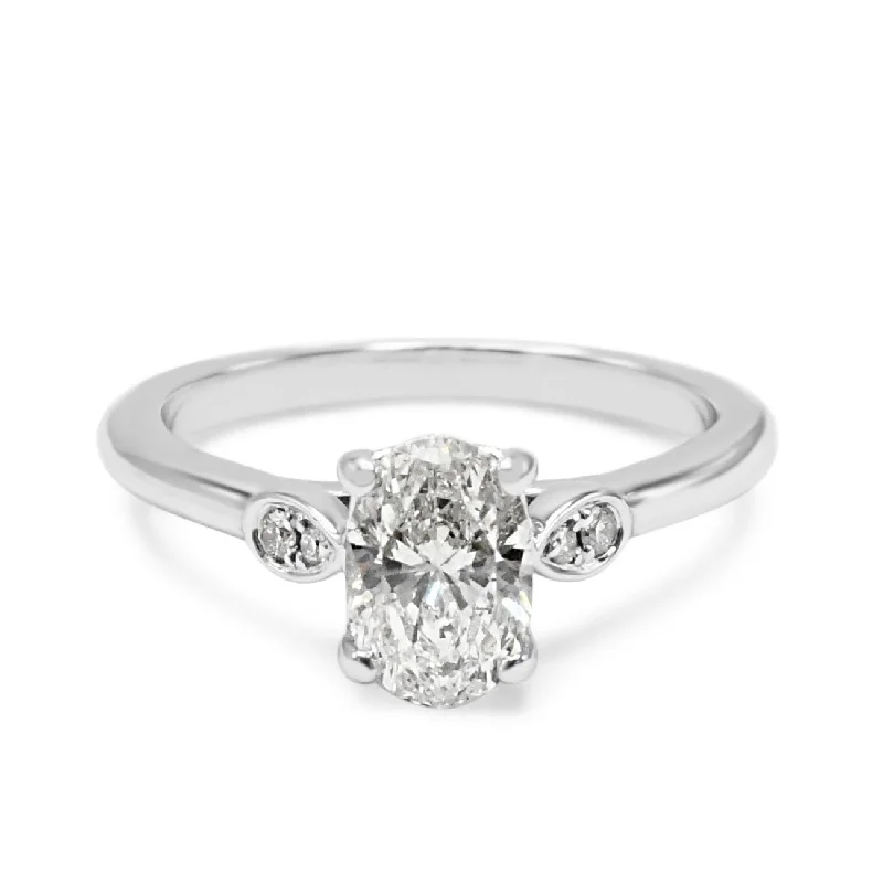 Cluster - Style Women's Diamond Rings with Multiple Small Diamonds Arranged in a Stunning PatternGIA Certificated Primrose Solitaire Oval Diamond Ring - 18ct Gold