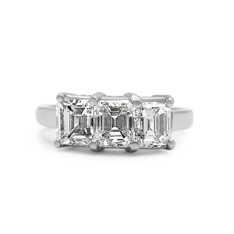 Cushion - Cut Women's Diamond Rings in Platinum with a Soft and Romantic AppearanceGIA Certificated 3 Stone Emerald Cut  Diamond Ring - Platinum