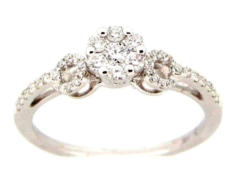 Cathedral - Style Women's Diamond Rings with a Raised Center Setting and Elaborate Metalwork14KWG 0.35CTW BR DIA CLUSTER CENTER WITH O SIDES FASHION RING