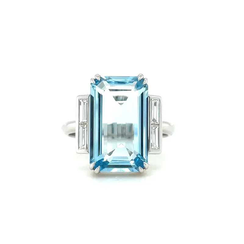 Channel - Set Women's Diamond Rings with Diamonds Securely Held in a Metal Groove for Durability18ct White Gold Blue Topaz & Diamond Ring