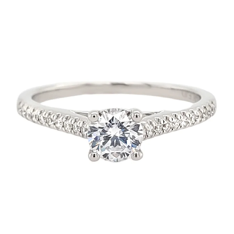 Pear - shaped diamond engagement ring with side baguette diamonds in 18K goldClassic Cathedral Style Diamond Engagement Ring Setting with Pave Band in White Gold, 0.14 cttw