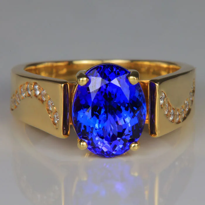 Men's Sapphire Engagement Rings in 18K White Gold with Pave Diamond Accents14K Yellow Gold Tanzanite And Diamond Ring 3.26 Carats By Christopher Michael