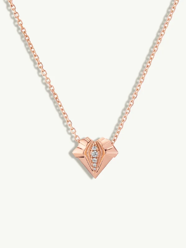 Three - stone diamond engagement ring in rose gold, symbolizing past, present, and futureAlexandria Pendant Necklace With Brilliant Pavé-Set Diamonds In 18K Rose Gold, 13mm