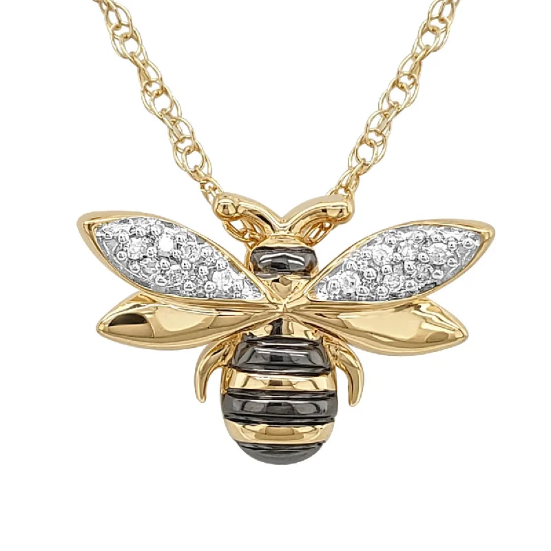 Pink diamond engagement ring in a rose - gold band with white - gold accentsDiamond Bee Pendant