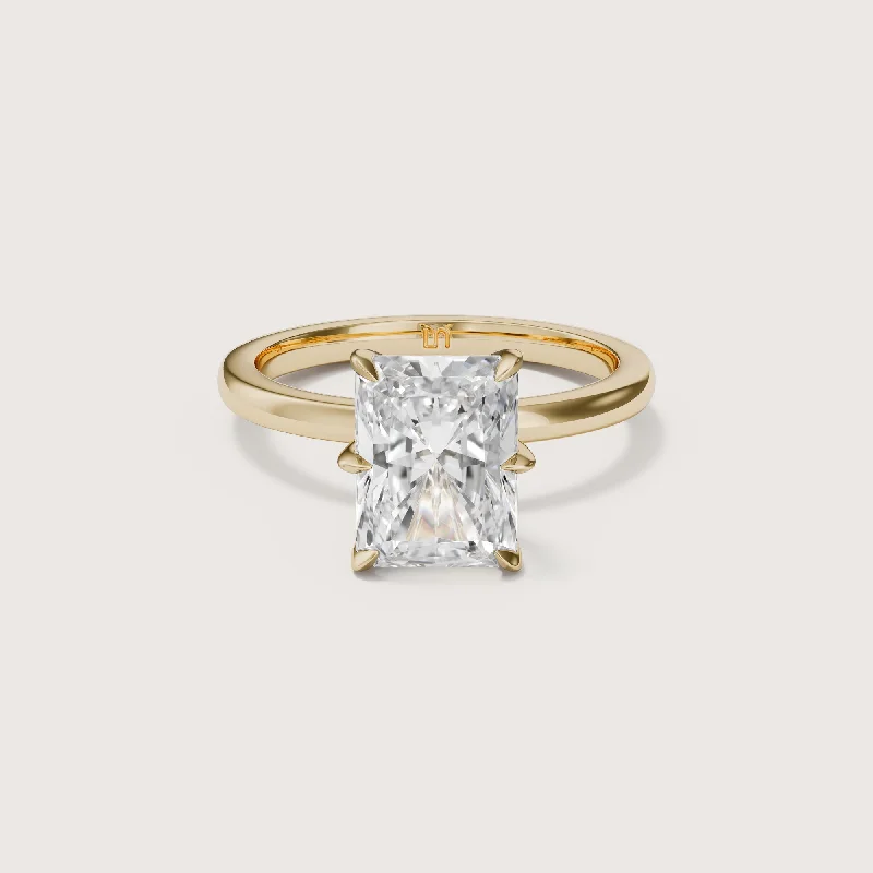 Asscher - cut diamond engagement ring with a pavé - set eternity band in platinumIcon Radiant Solitaire - 6 Claw