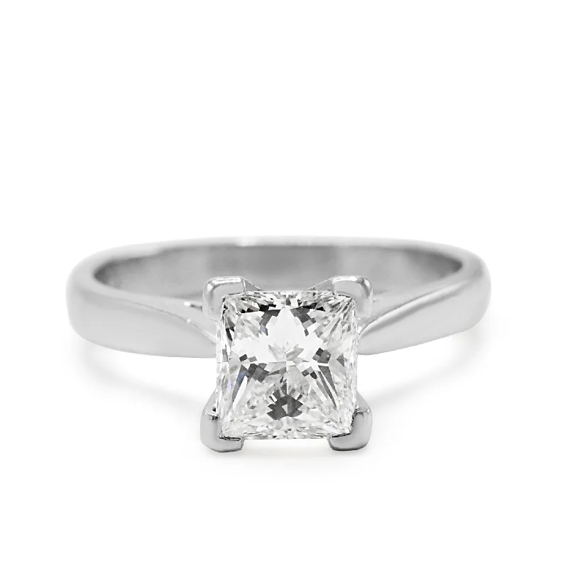 Channel - Set Women's Diamond Rings with Diamonds Securely Held in a Metal Groove for DurabilitySolitaire Princess Cut Diamond Ring - Platinum