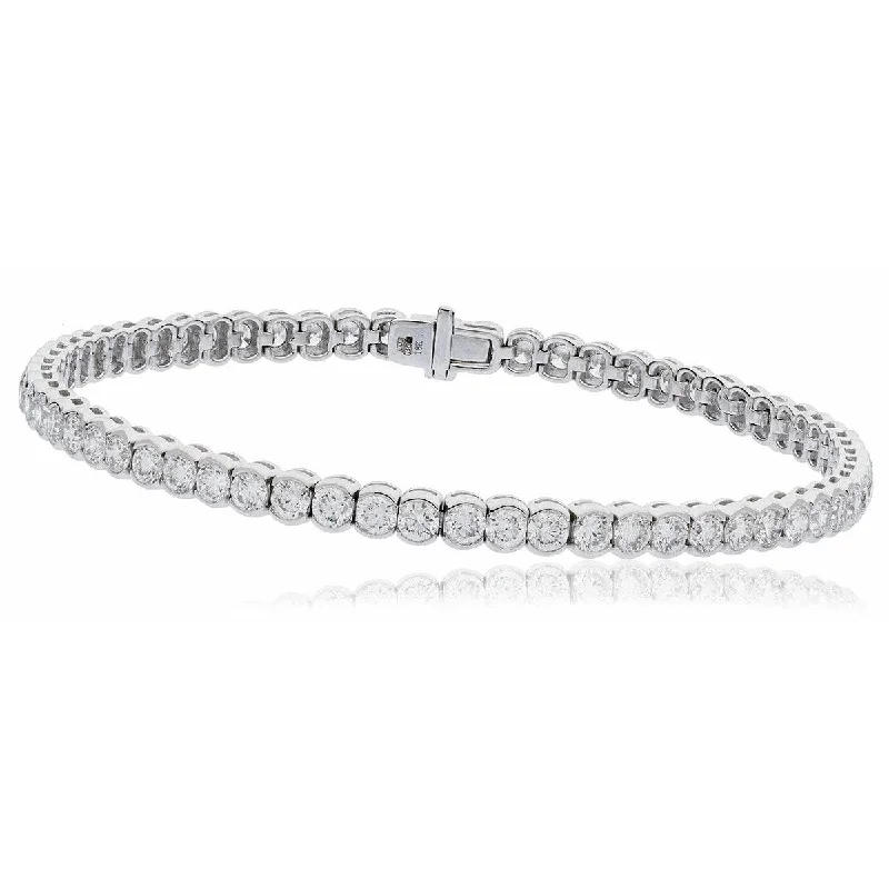 Boho - Style Bangle Bracelets with Feather and Bead EmbellishmentsRound Cut Diamond Line Tennis Bracelet in Semi Bezel setting