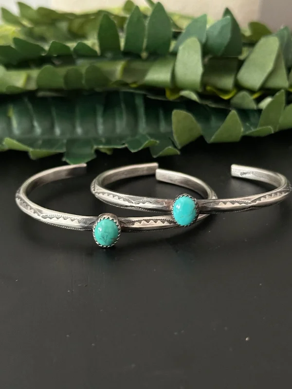 Women's Sterling Silver Cuff Bracelets with Engraved Floral Patterns for a Romantic LookNavajo Made Kingman Turquoise & Sterling Silver Cuff Bracelet