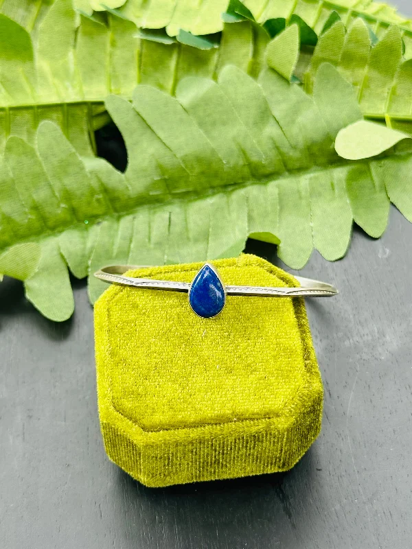 Stackable Women's Cuff Bracelets in Different Sizes and Materials for Layered StylingNavajo Made Lapis & Sterling Silver Cuff Bracelet