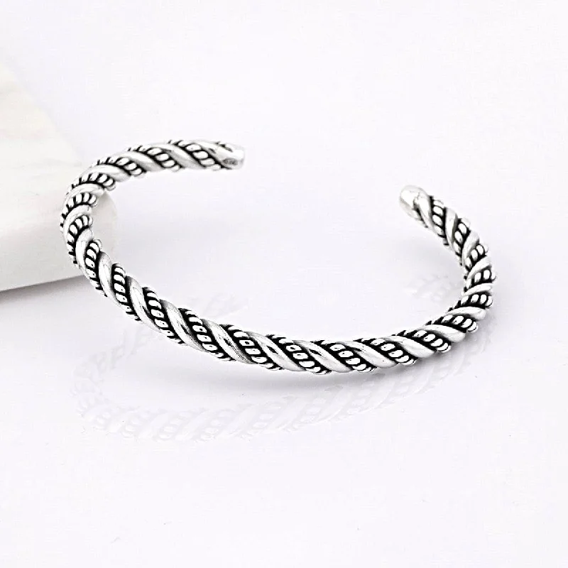 Bangle Bracelets with Celtic Knotwork for a Symbolic and Stylish LookMen's Sterling Silver Twisted Chain Bangle Bracelet