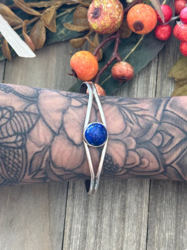 Women's Stainless Steel Cuff Bracelets with Geometric Designs for a Modern and Minimalist StyleNavajo Made Lapis & Sterling Silver Cuff Bracelet