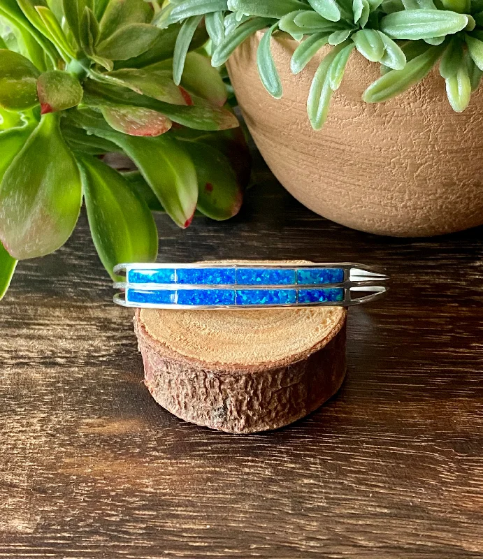 Large - Sized Women's Leather Cuff Bracelets with Studded Details for a Punk - Rock VibeNavajo Made Blue Opal & Sterling Silver Inlay Cuff Bracelet