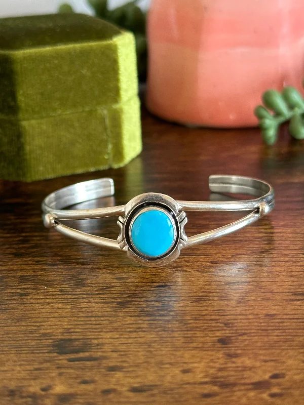 Women's Sterling Silver Cuff Bracelets with Engraved Floral Patterns for a Romantic LookNavajo Made Kingman Turquoise & Sterling Silver Cuff Bracelet