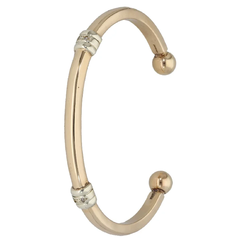 Adjustable Bangle Bracelets with Magnetic Closures for Easy Wear and Removal9ct Gold 0.02ct Diamond Torque Bangle