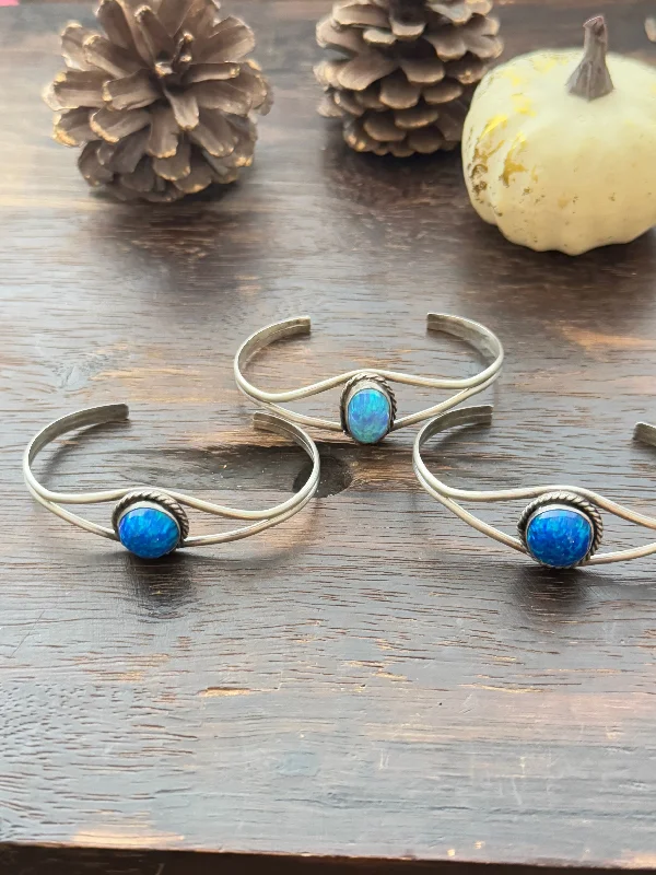 Stackable Women's Cuff Bracelets in Different Sizes and Materials for Layered StylingNavajo Made Opal Sterling Silver Cuff Bracelet