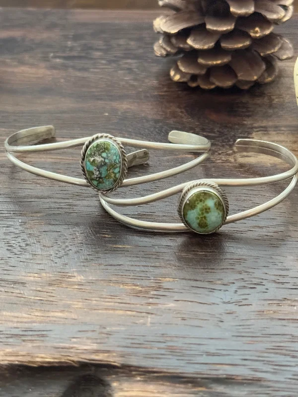 Adjustable Women's Elastic Cuff Bracelets with Pearl Accents for a Feminine TouchNavajo Made Sonoran Mountain Turquoise & Sterling Silver Cuff Bracelet