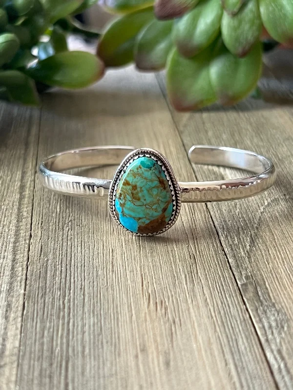 Stackable Women's Cuff Bracelets in Different Sizes and Materials for Layered StylingSouthwest Made Kingman Turquoise & Sterling Silver Cuff Bracelet