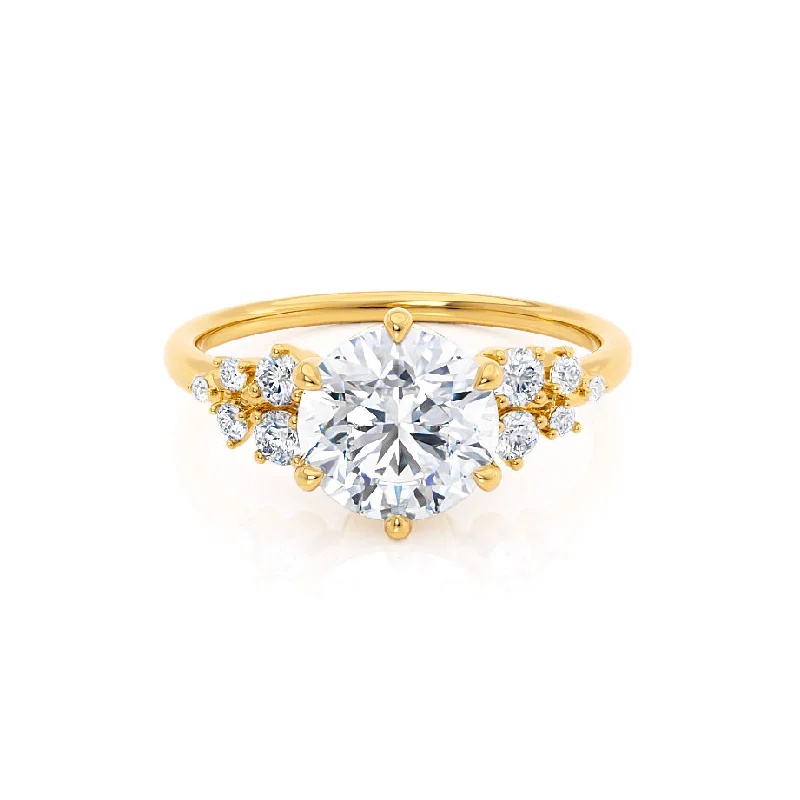 Pear - Shaped Engagement Rings in Yellow Gold with a Diamond - Encrusted BandALYA - Round Moissanite Starburst Cluster Shoulder Set Engagement Ring 18k Yellow Gold