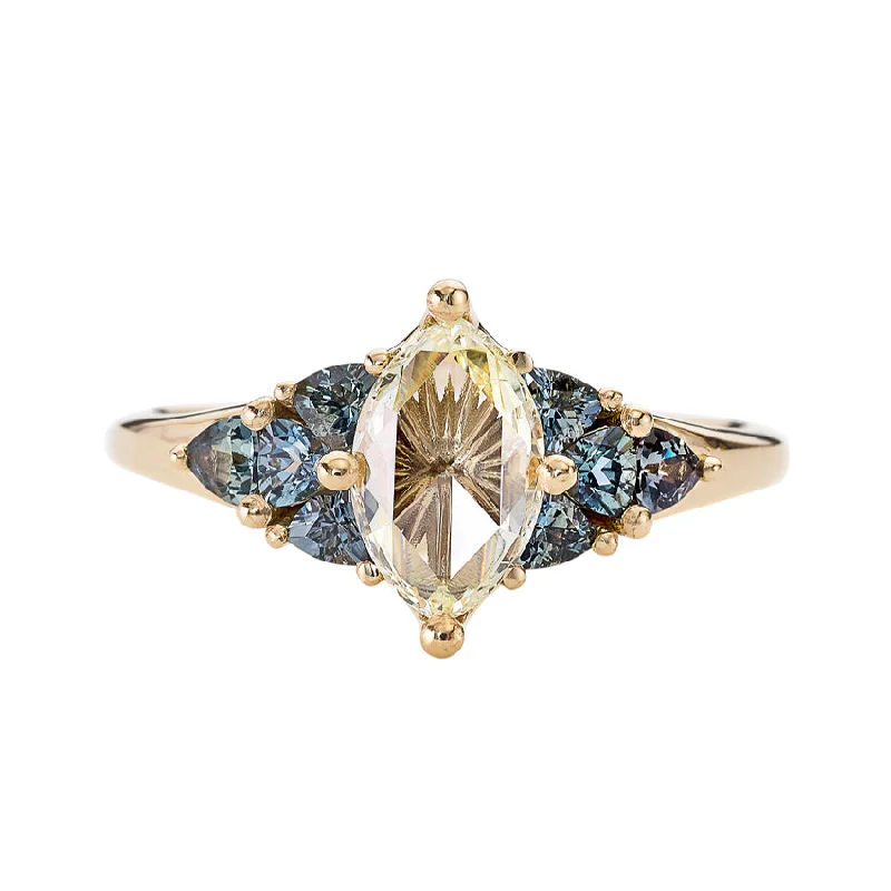 Pear - Shaped Engagement Rings in Yellow Gold with a Diamond - Encrusted BandStarburst Rose Cut Diamond Engagement Ring with Teal Sapphire Trillions