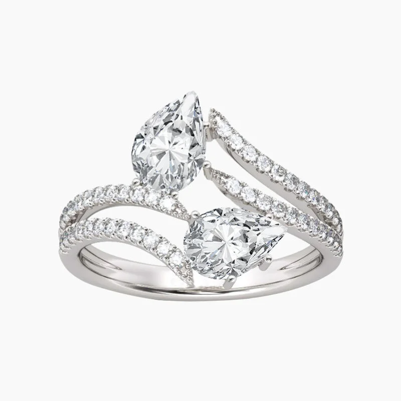 Art Deco Engagement Rings with Geometric Patterns and Baguette - Cut Diamond AccentsTwo-stone Pear Shape Engagement Ring