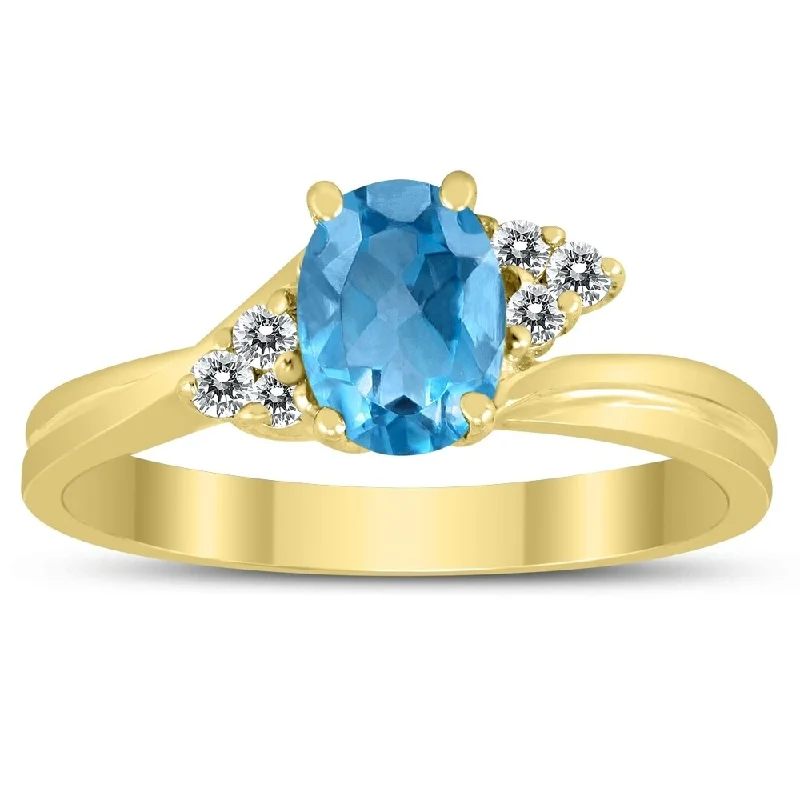 Aquamarine Gemstone Rings in 9K Gold with a Bezel Setting for a Modern and Secure Fit7X5MM Blue Topaz and Diamond Twist Ring in 10K Yellow Gold