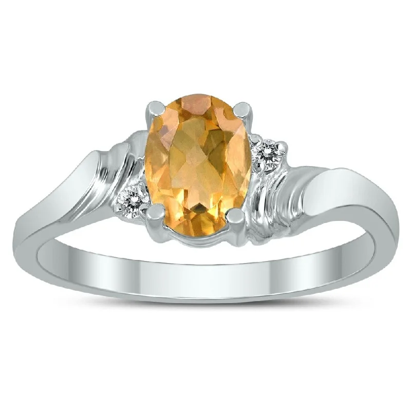 Aquamarine Gemstone Rings in 9K Gold with a Bezel Setting for a Modern and Secure Fit7X5MM Citrine and Diamond Wave Ring in 10K White Gold