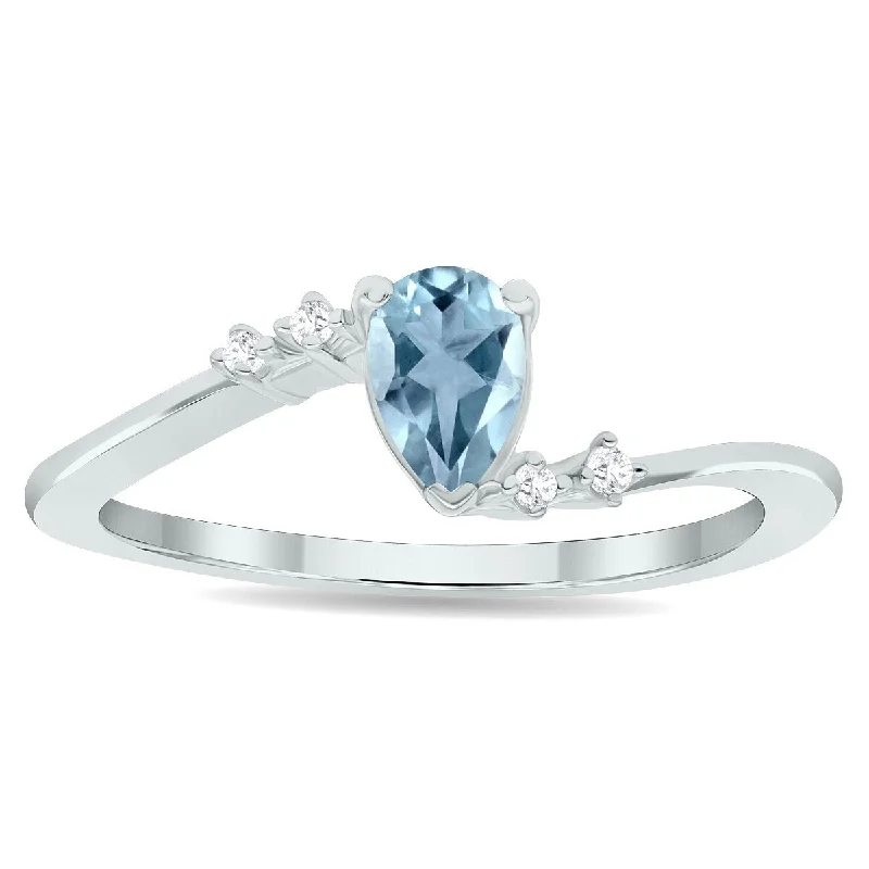 Sapphire Gemstone Rings in 18K White Gold with Diamond Accents for an Elegant EngagementWomen's Aquamarine and Diamond Wave Ring in 10K White Gold