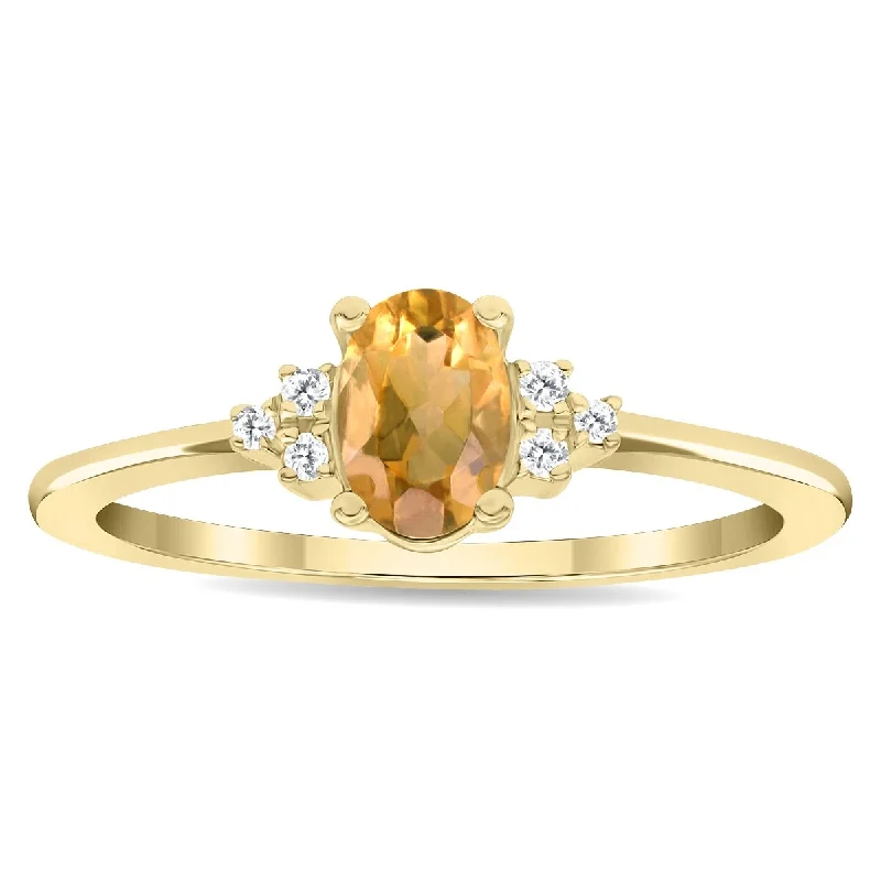 Amethyst Gemstone Rings in Sterling Silver with a Halo of Cubic Zirconia for a Budget - Friendly LuxuryWomen's Oval Shaped Citrine and Diamond Half Moon Ring in 10K Yellow Gold