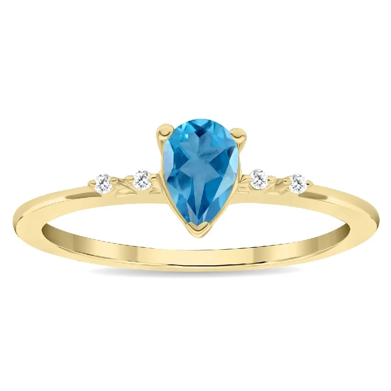 Emerald Gemstone Rings Set in Platinum with Filigree Work for a Vintage - Inspired LookWomen's Pear Shaped Blue Topaz and Diamond Sparkle Ring in 10K Yellow Gold