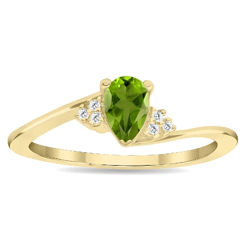 Ruby Gemstone Rings in 14K Yellow Gold with a Solitaire Setting for a Classic and Bold StatementWomen's Pear Shaped Peridot and Diamond Tierra Ring in 10K Yellow Gold