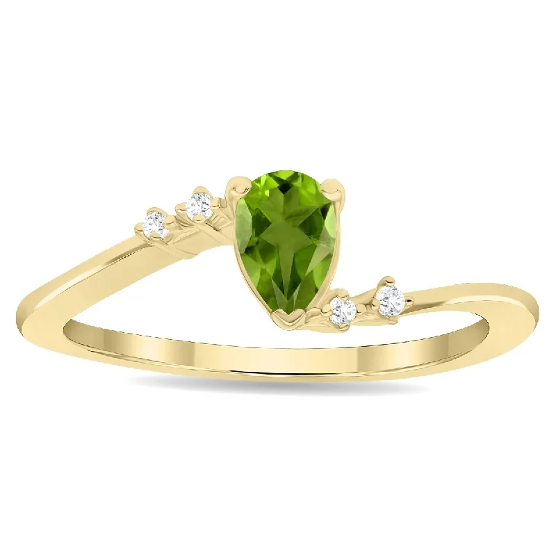 Iolite Gemstone Rings in 10K Gold with a Twisted Band for a Distinctive and Stylish AccessoryWomen's Pear Shaped Peridot and Diamond Wave Ring in 10K Yellow Gold