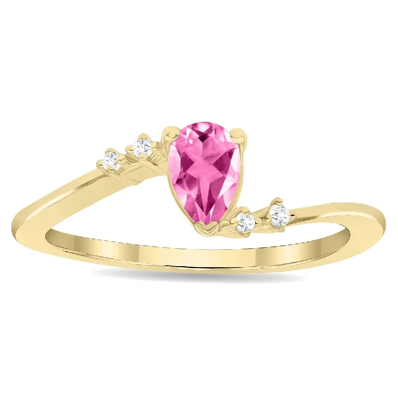 Tanzanite Gemstone Rings in 10K Gold with a Trilogy Design for a Sophisticated GiftWomen's Pear Shaped Pink Topaz and Diamond Wave Ring in 10K Yellow Gold