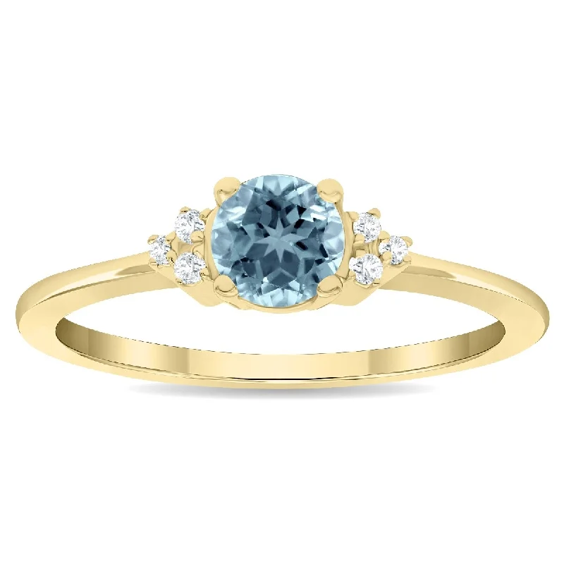 Ruby Gemstone Rings in 14K Yellow Gold with a Solitaire Setting for a Classic and Bold StatementWomen's Round Shaped Aquamarine and Diamond Half Moon Ring in 10K Yellow Gold