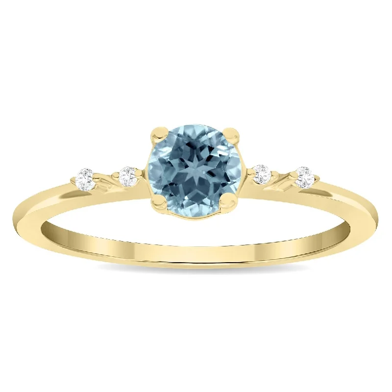 Tanzanite Gemstone Rings in 10K Gold with a Trilogy Design for a Sophisticated GiftWomen's Round Shaped Aquamarine and Diamond Sparkle Ring in 10K Yellow Gold